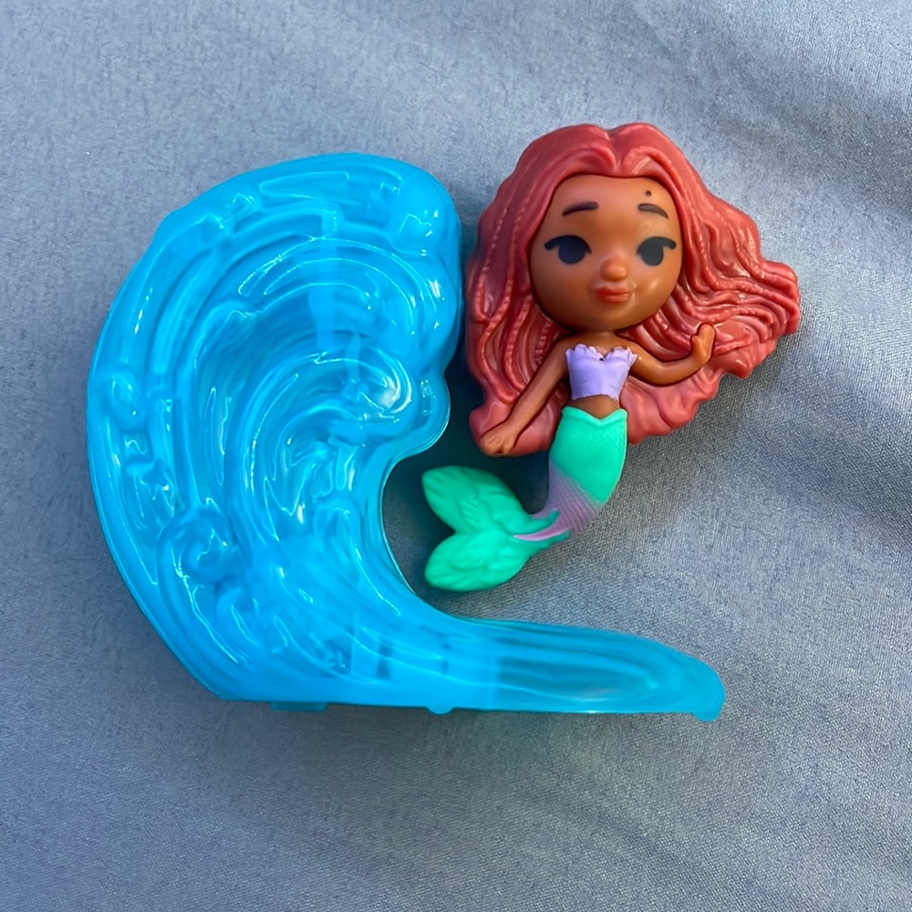This is a little mermaid toy from Mc Donalds!